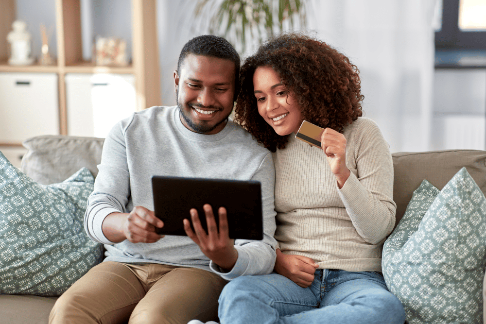 digitally-minded adult couple shopping via ecommerce